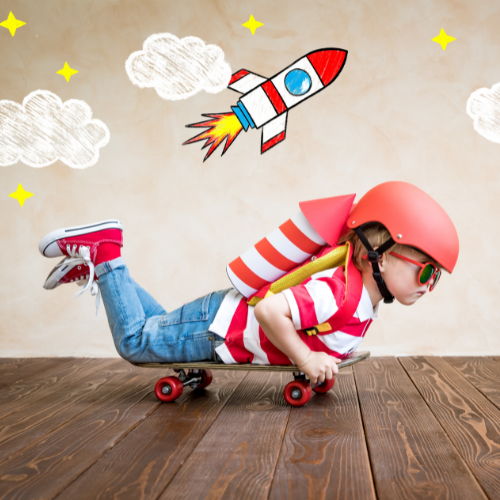 A child laid on a skateboard appearing to zoom from one side of the room to another, with rocket, cloud and stars illustration above the child.
